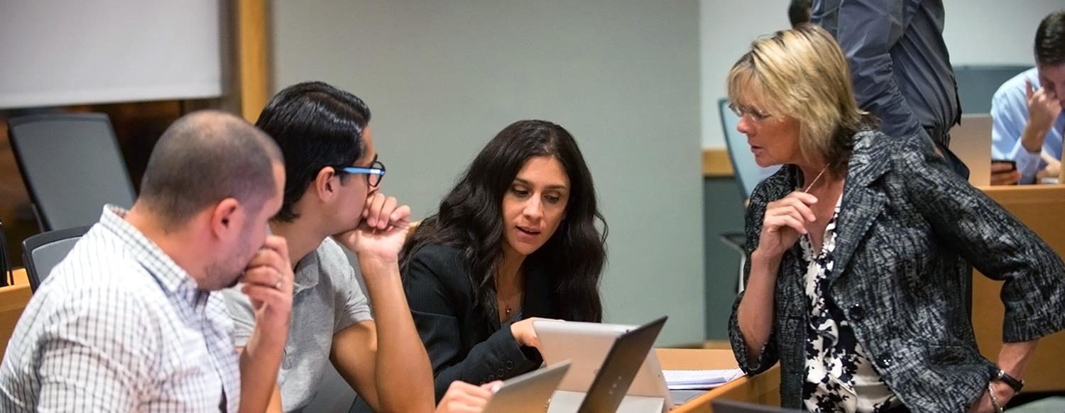 Business Communications class discussing program information