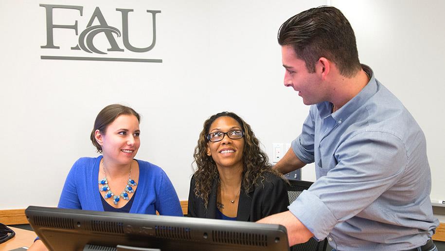 Three Marketing students discussing admissions